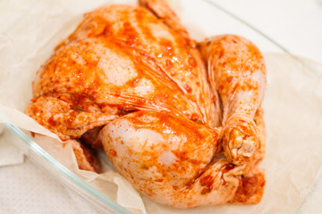 marinated chicken with seasonings. step-by-step recipe. baked meat in the oven. delicious and juicy white meat. dietary food.the view from the top. space for text.