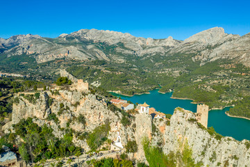 Panoramic view of popular Spanish vacation destination El Castell de Guadalest above a beautiful...