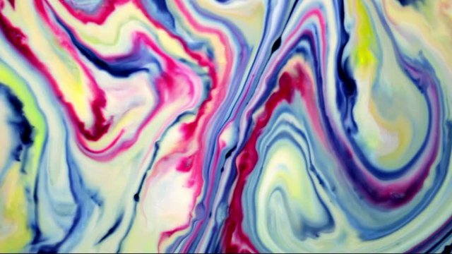 Marbling, multi-colored swirled, stone-like patterns. Paint floating, spreading on the surface of a liquid. Abstract fluid art, ink in motion. Magical marble texture. Ink bloom, blast, paint explosion