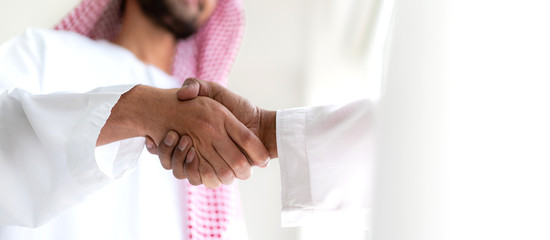 Successful of arab business partner handshake together in modern office.Partnership approval and...