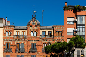 Fototapeta na wymiar Spanish architecture on Madrid street. Madrid building facade.