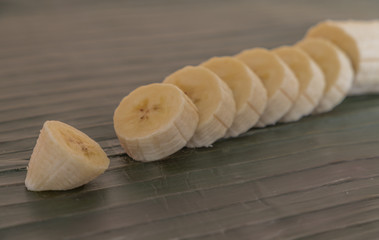 slices of banana on banana leaf