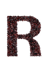 Letter R of the English alphabet of freshly roasted cocoa beans on a white isolated background. coffee pattern made from coffee beans