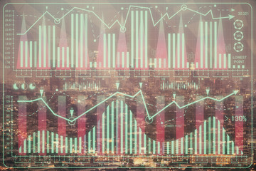 Financial graph on night city scape with tall buildings background double exposure. Analysis concept.