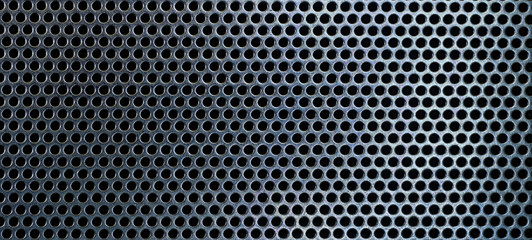 Metal background, black steel plate with holes,Black metal texture steel background. Perforated...