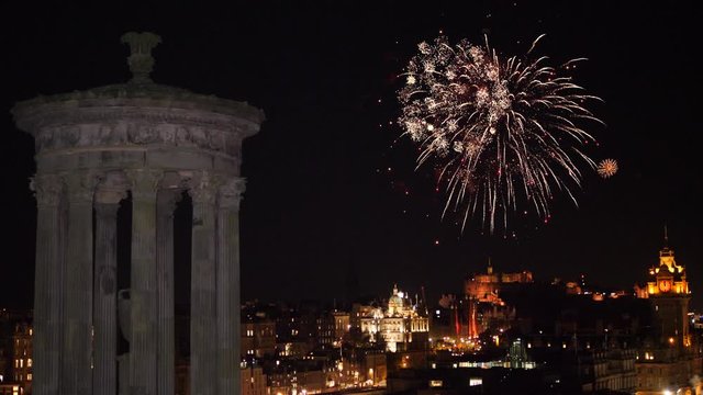 4K: Fireworks over the Edinburgh Skyline / Cityscape from Calton Hill. Perfect for New Year / Hogmanay