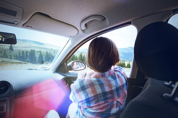 girl traveling in a car