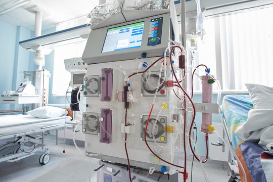 Working hemodiafiltration machine at intensive care department. Patient with renal failure