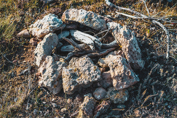 Camp fire rock circle in the mountains