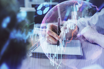 Forex chart displayed on woman's hand taking notes background. Concept of research. Double exposure