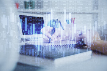 Financial graph displayed on woman's hand taking notes background. Concept of research. Double exposure