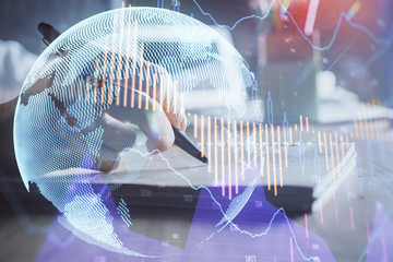 Financial charts displayed on woman's hand taking notes background. Concept of research. Double...