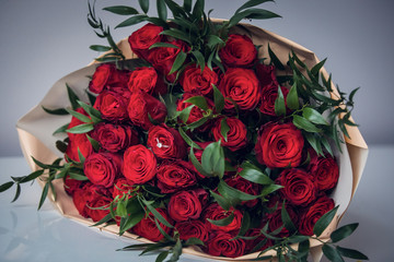 Red roses with diamond ring.