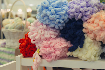 Colors wool balls on shop display stand for sale