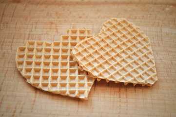 card for lovers two waffle hearts on a wooden board