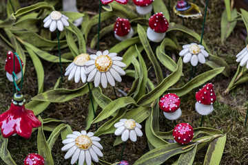 Traditional Hungarian ceramic flowers to decorate the interior of gardens and flower pots 