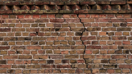 Old barn wall. Cracked brick wall. Background texture.