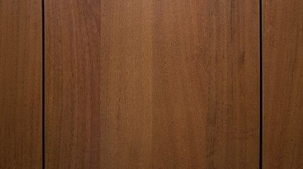 Naklejka premium Brown wooden dark color background with two stripes. Wood texture.