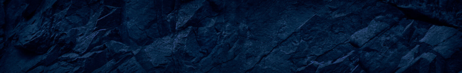 Abstract black stone background with copy space. Deep blue grunge background. Toned mountain...