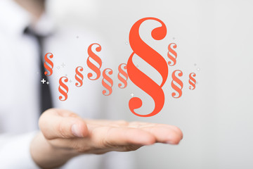 Fototapeta premium paragraph law sign digital in hand