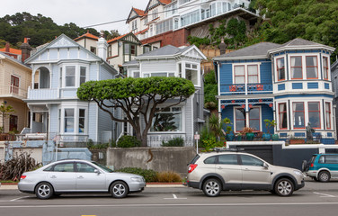 Wellington New Zealand . Houses and cars near tje waterfront Oriental Parade.