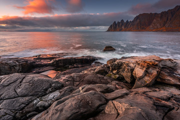 Fototapeta na wymiar Autumn in Senja Island in Norway with beautiful light and colors.