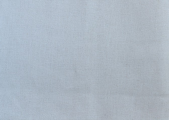 Gray fabric for embroidery with a cross close-up for the whole frame