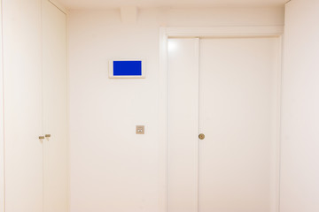 white decorated hallway to office entrance