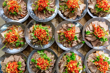 Delicious dried beef slices cold dish,the ingredients are red pepper and garlic with coriander.Chinese food.