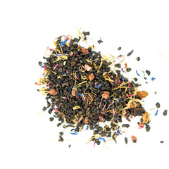 pile of natural green tea mix contains pieces of raisins, candied pineapple, currant berries, pieces of red papaya, petals of calendula, blue and red cornflower