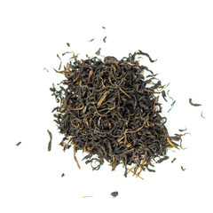 pile of natural green whole leaf china tea steamed in milk isolated on white background