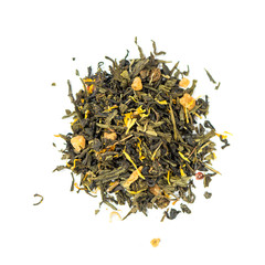 pile of natural green tea mix contains slices of ginger and papaya, pink pepper, safflower and marigolds