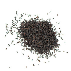 pile of natural whole leaf english brackfast ceylon tea isolated on white background