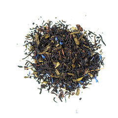 pile of natural black and green tea mix contains cornflower, slices and leaves of strawberries