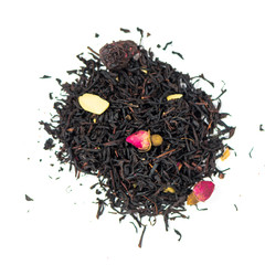 pile of natural black tea mix with candied cherries, sliced almonds and red rose buds