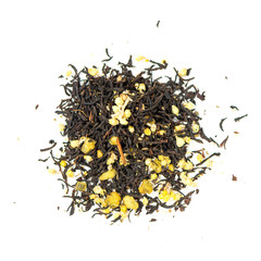 pile of natural whole leaf black tea contains peach, cranberries, blue cornflower and rose petals