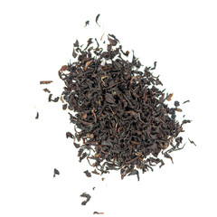 pile of natural whole leaf indian tea isolated on white background