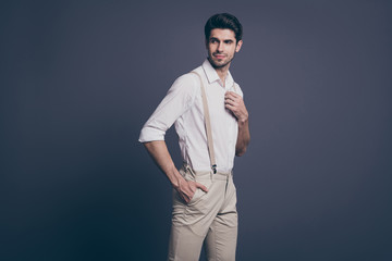 Portrait of magnificent guy look good want attract girl rich wealthy millionaire fix correct button...