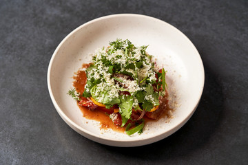 Healthy vegetable salad with grated cheese, close-up