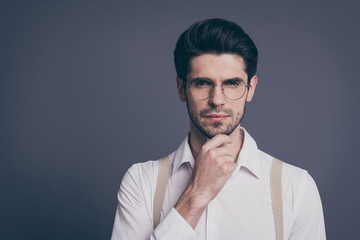 Close-up portrait of his he nice attractive imposing skilled smart clever content focused brunette guy thinking touching chin isolated over grey violet purple pastel color background