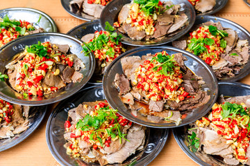 Delicious dried beef slices cold dish,the ingredients are red pepper and garlic with coriander.Chinese food.