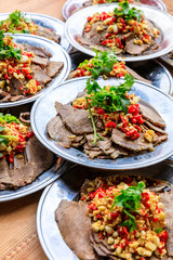 Delicious dried beef slices cold dish,the ingredients are red pepper and garlic with coriander.Chinese food.