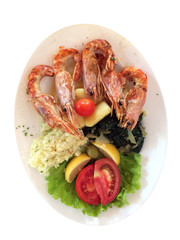 Grilled shrimps with rice, tamoto and salad top view isolated on white