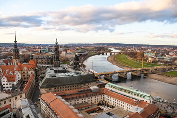 Naklejka na ściany i meble Panorama of Dresden city with bridges over Elbe river at sunset from lutheran church of Our Lady Frauenkirche, Germany.