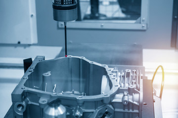 The  CMM machine measuring dimension of the casting gear box housing . The quality control in...