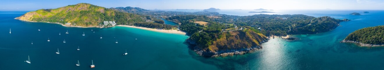 Fototapeta na wymiar Aerial panorama of Phuket island. Nai Harn beach, Ya Nui beach and Promthep Cape are in the frame