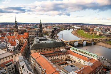 Fototapeta na wymiar Panorama of Dresden city with bridges over Elbe river at sunset from lutheran church of Our Lady Frauenkirche, Germany.