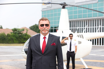 businessman on travel by helicopter