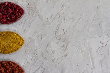 delicious and flavorful spices for food. lots of seasonings in the bowls. additives for cooking. Georgian seasonings. the concept of cooking and foodies. the view from the top. space for text.