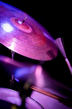 Drum brush hitting cymbal © Vanessa
